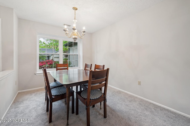 119 Morning Glory, Whiting, NJ 08759 - dining area with a chandelier, carpet, baseboards, and a textured ceiling