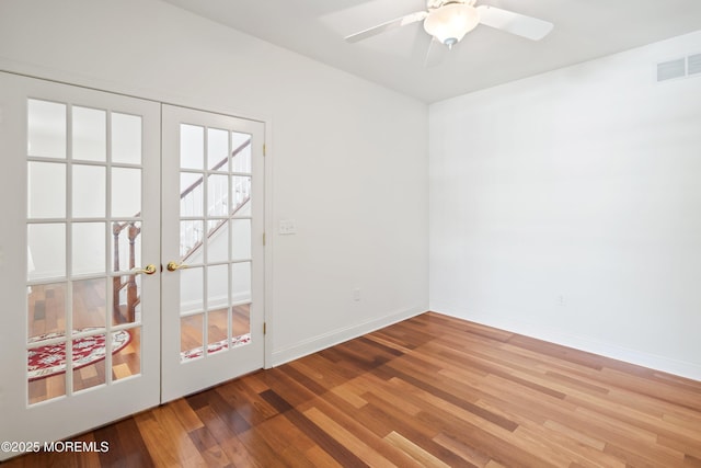 55 Freedom Hills Dr, Barnegat, NJ 08005 - unfurnished room featuring wood finished floors, french doors, baseboards, and a ceiling fan