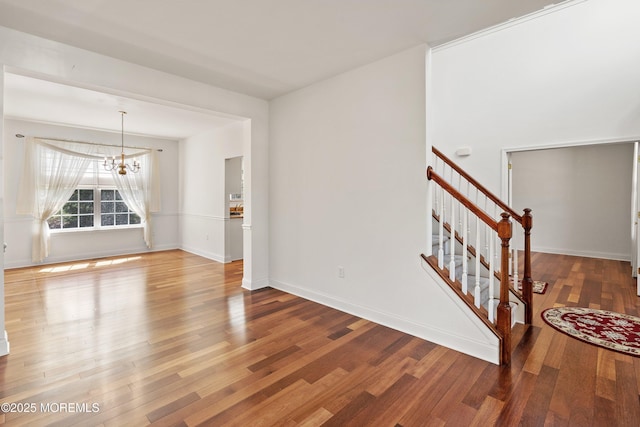 55 Freedom Hills Dr, Barnegat, NJ 08005 - interior space with a chandelier, wood finished floors, stairs, and baseboards