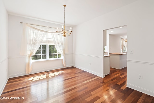 55 Freedom Hills Dr, Barnegat, NJ 08005 - unfurnished dining area with a chandelier, wood finished floors, and baseboards