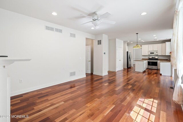 55 Freedom Hills Dr, Barnegat, NJ 08005 - unfurnished living room featuring recessed lighting, ceiling fan, dark wood-style flooring, and baseboards