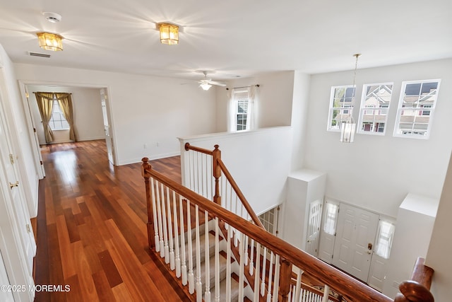 55 Freedom Hills Dr, Barnegat, NJ 08005 - hall with an upstairs landing, wood finished floors, and baseboards