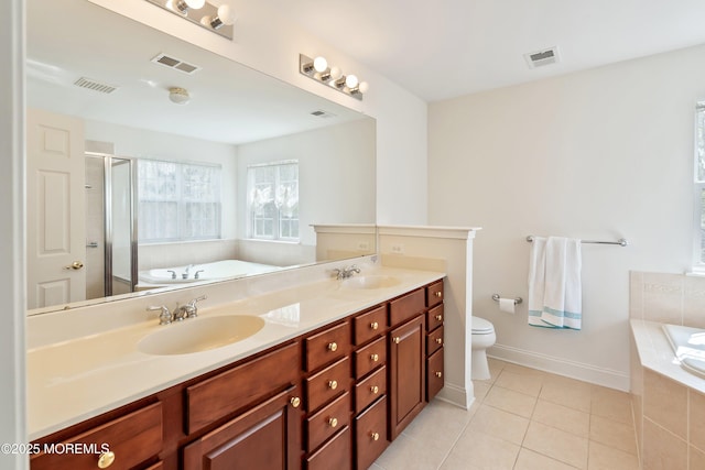 55 Freedom Hills Dr, Barnegat, NJ 08005 - full bathroom featuring tile patterned flooring, a bath, double vanity, a shower stall, and toilet