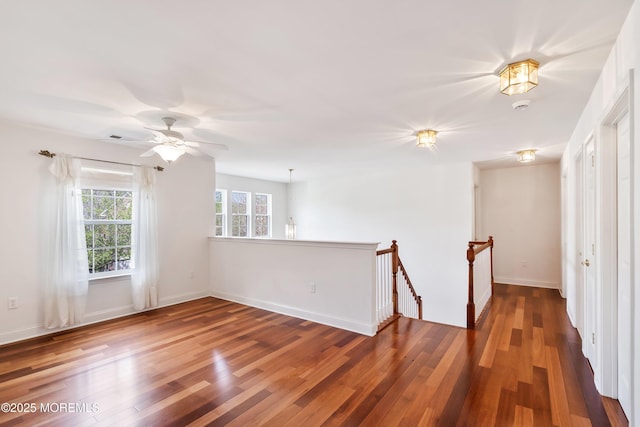 55 Freedom Hills Dr, Barnegat, NJ 08005 - spare room featuring wood finished floors, ceiling fan, and baseboards