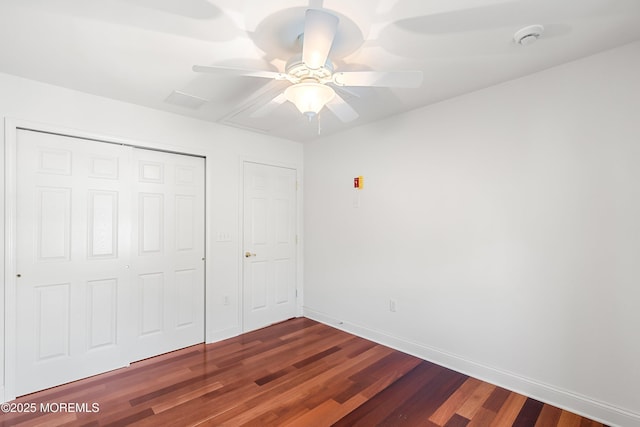 55 Freedom Hills Dr, Barnegat, NJ 08005 - unfurnished bedroom featuring wood finished floors, a closet, baseboards, and a ceiling fan