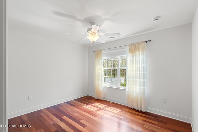 55 Freedom Hills Dr, Barnegat, NJ 08005 - empty room featuring wood finished floors, ceiling fan, baseboards, and a smoke detector
