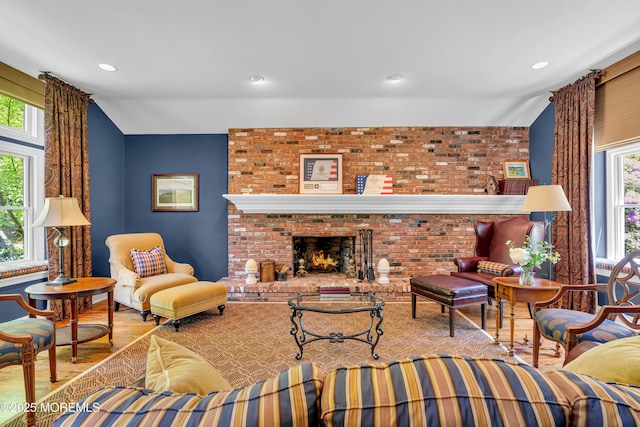 7 Seagull Ln, Lincroft, NJ 07738 - living area with wood finished floors, lofted ceiling, recessed lighting, and a brick fireplace