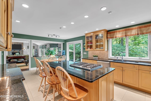 7 Seagull Ln, Lincroft, NJ 07738 - kitchen with a sink, appliances with stainless steel finishes, tasteful backsplash, a breakfast bar area, and recessed lighting