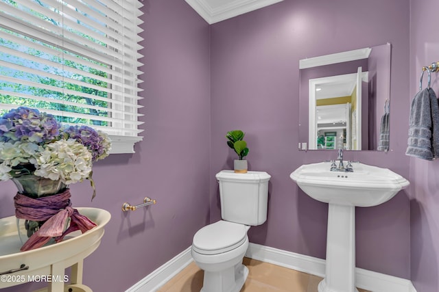 7 Seagull Ln, Lincroft, NJ 07738 - bathroom with baseboards, toilet, and crown molding