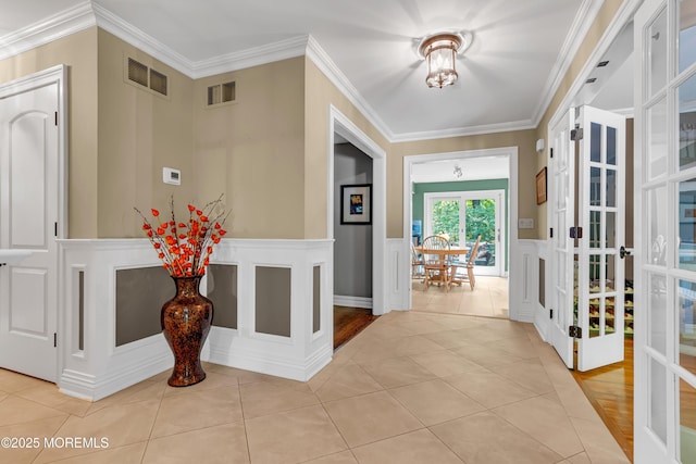 7 Seagull Ln, Lincroft, NJ 07738 - foyer entrance featuring crown molding and light tile patterned flooring