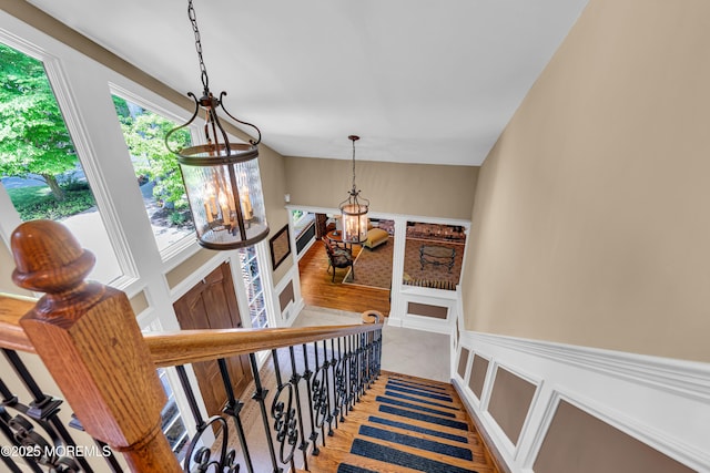 7 Seagull Ln, Lincroft, NJ 07738 - stairway with a chandelier and wood finished floors