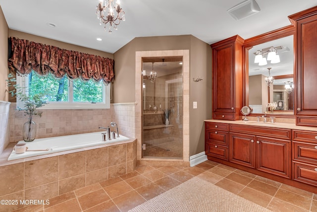 7 Seagull Ln, Lincroft, NJ 07738 - bathroom with a chandelier, a garden tub, a shower stall, vanity, and recessed lighting