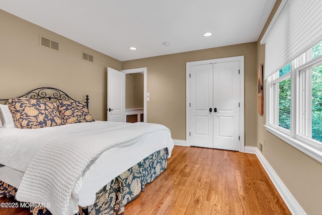 7 Seagull Ln, Lincroft, NJ 07738 - bedroom with light wood-style flooring, a closet, baseboards, and recessed lighting