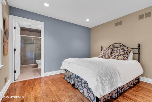 7 Seagull Ln, Lincroft, NJ 07738 - bedroom with baseboards, wood finished floors, recessed lighting, and ensuite bath