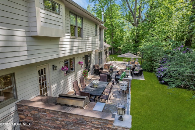 7 Seagull Ln, Lincroft, NJ 07738 - view of patio with an outdoor living space and an outdoor kitchen