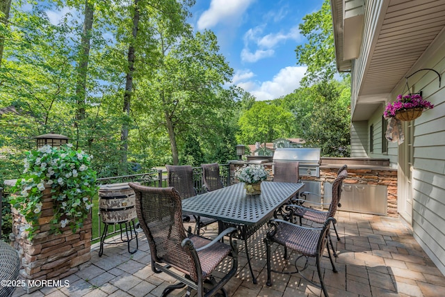 7 Seagull Ln, Lincroft, NJ 07738 - view of patio / terrace with exterior kitchen, a grill, and outdoor dining area