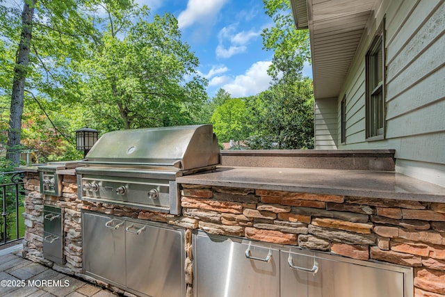 7 Seagull Ln, Lincroft, NJ 07738 - view of patio featuring a grill and an outdoor kitchen