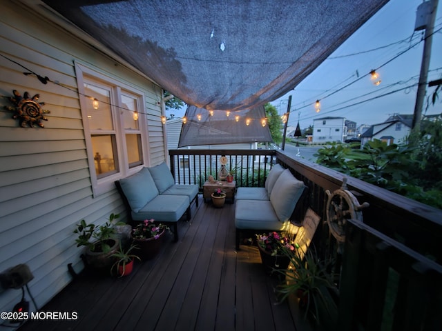 deck with an outdoor hangout area