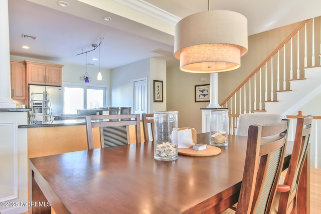 dining space with recessed lighting and stairway