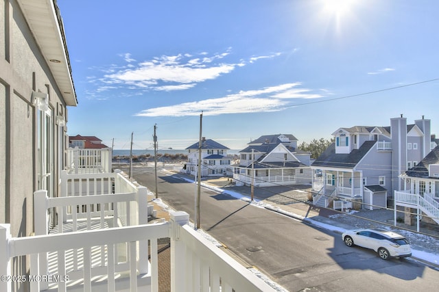 balcony featuring a residential view