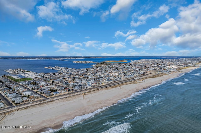 bird's eye view of waterfront with a beach