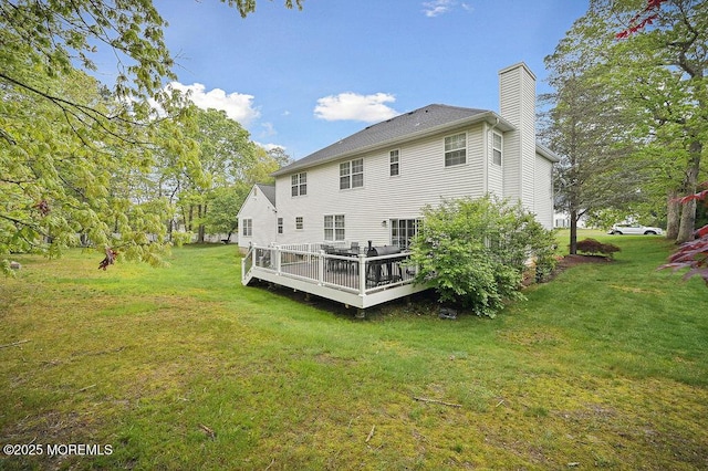 8 Sugar Pine Dr, Jackson, NJ 08527 - rear view of property featuring a chimney, a lawn, and a wooden deck