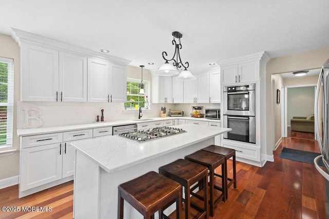 8 Sugar Pine Dr, Jackson, NJ 08527 - kitchen with stainless steel appliances, a sink, dark wood-style flooring, baseboards, and recessed lighting