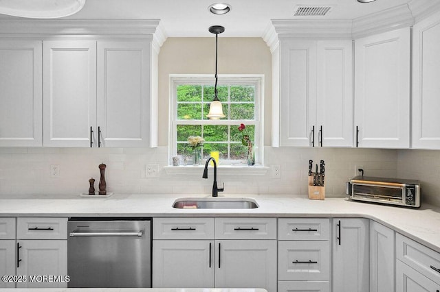 8 Sugar Pine Dr, Jackson, NJ 08527 - kitchen with stainless steel dishwasher, a sink, white cabinets, backsplash, and recessed lighting