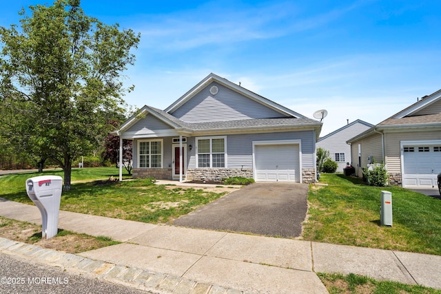 43 Osprey Pl, Barnegat, NJ 08005 - ranch-style home featuring stone siding, driveway, a front yard, and a garage