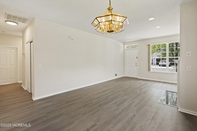 43 Osprey Pl, Barnegat, NJ 08005 - spare room featuring a chandelier, dark wood-style floors, baseboards, and recessed lighting