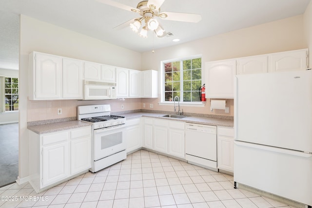 43 Osprey Pl, Barnegat, NJ 08005 - kitchen featuring white appliances, a sink, a ceiling fan, and healthy amount of natural light