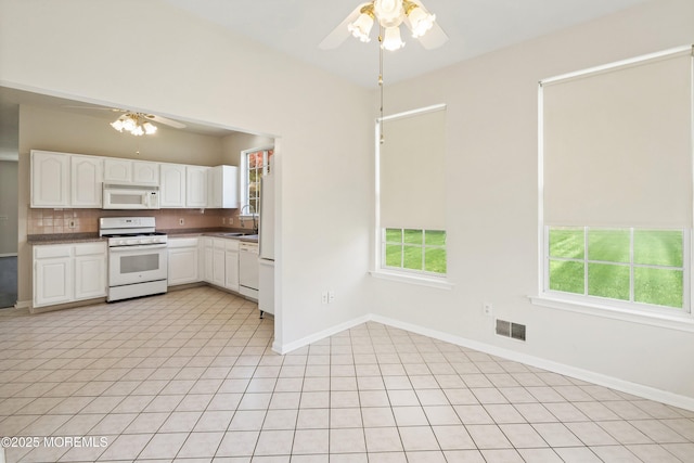 43 Osprey Pl, Barnegat, NJ 08005 - kitchen featuring white appliances, a ceiling fan, white cabinetry, and healthy amount of natural light