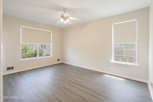 43 Osprey Pl, Barnegat, NJ 08005 - unfurnished room featuring ceiling fan, dark wood-style flooring, and baseboards