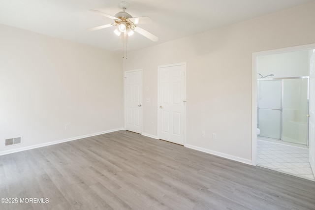 43 Osprey Pl, Barnegat, NJ 08005 - unfurnished bedroom featuring wood finished floors, ensuite bath, and baseboards