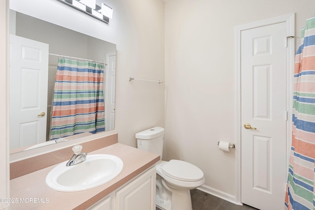 43 Osprey Pl, Barnegat, NJ 08005 - bathroom with vanity, toilet, baseboards, a shower with shower curtain, and wood finished floors