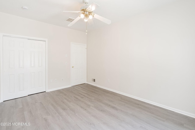 43 Osprey Pl, Barnegat, NJ 08005 - unfurnished bedroom with light wood finished floors, baseboards, a closet, and ceiling fan