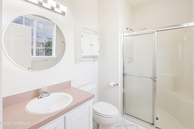 43 Osprey Pl, Barnegat, NJ 08005 - bathroom featuring a stall shower, toilet, vanity, and tile patterned flooring