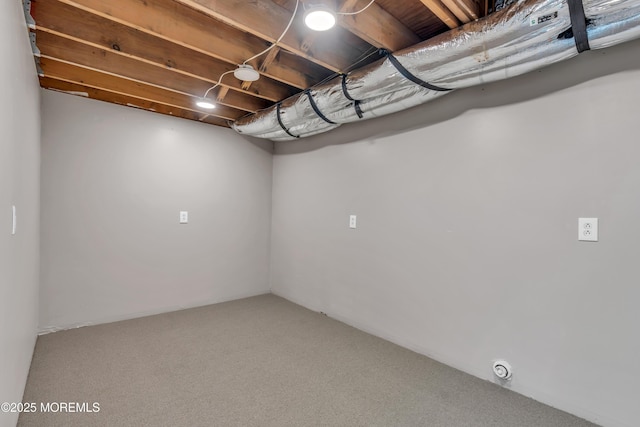 finished below grade area featuring carpet flooring
