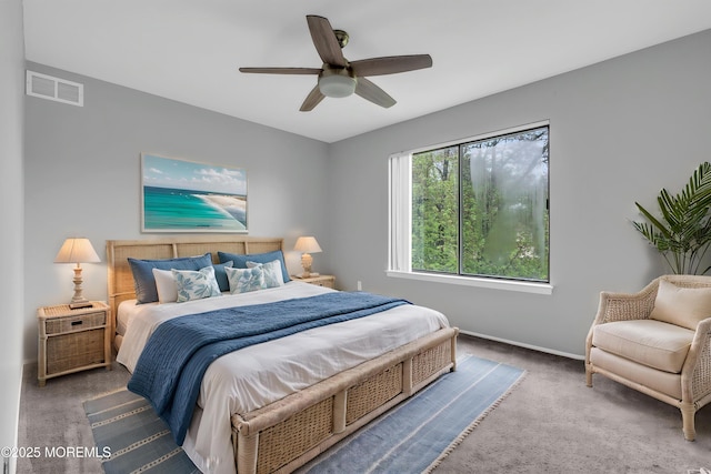 bedroom featuring carpet, baseboards, and ceiling fan
