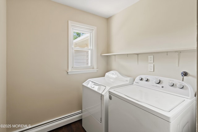 laundry room with a baseboard radiator and separate washer and dryer