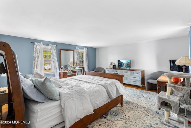 bedroom featuring wood finished floors