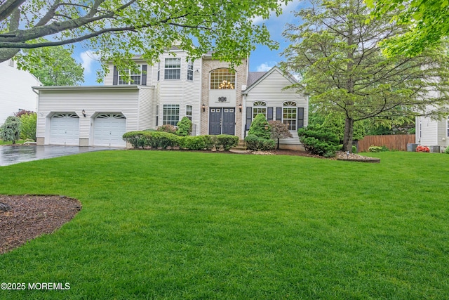 352 Meadowood Rd, Jackson, NJ 08527 - traditional-style house featuring concrete driveway and an attached garage