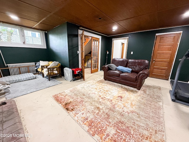 7 Dock St, Toms River, NJ 08753 - living room featuring unfinished concrete floors, wood ceiling, and recessed lighting