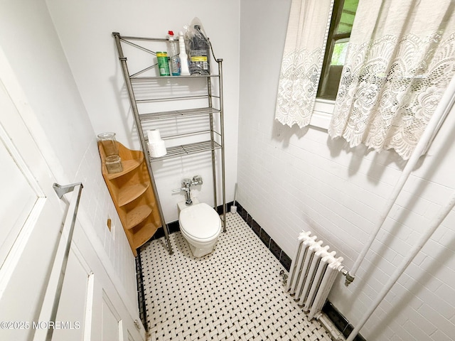 7 Dock St, Toms River, NJ 08753 - bathroom featuring radiator and toilet