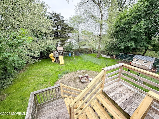 7 Dock St, Toms River, NJ 08753 - view of yard with a playground, a storage shed, an outbuilding, and a wooden deck