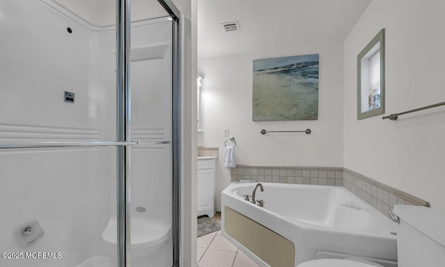 221 Harrison Ave, Oakhurst, NJ 07755 - bathroom featuring a shower stall, tile patterned flooring, a garden tub, and toilet