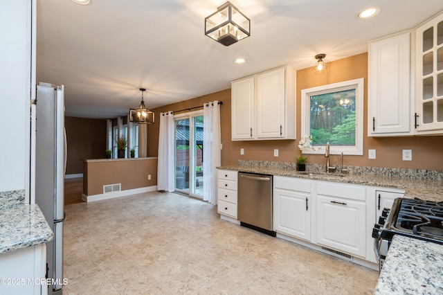 476 Birch Bark Dr, Brick, NJ 08723 - kitchen with appliances with stainless steel finishes, a sink, white cabinetry, glass insert cabinets, and recessed lighting