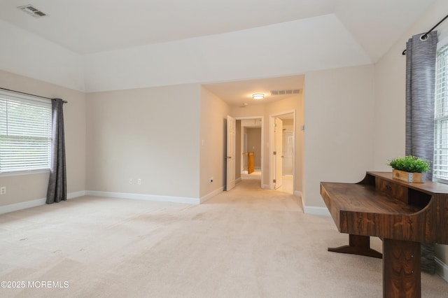 476 Birch Bark Dr, Brick, NJ 08723 - living area with light colored carpet, lofted ceiling, and baseboards