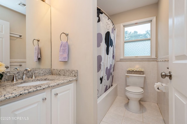 476 Birch Bark Dr, Brick, NJ 08723 - full bath with tile patterned floors, toilet, vanity, shower / bath combo with shower curtain, and tile walls