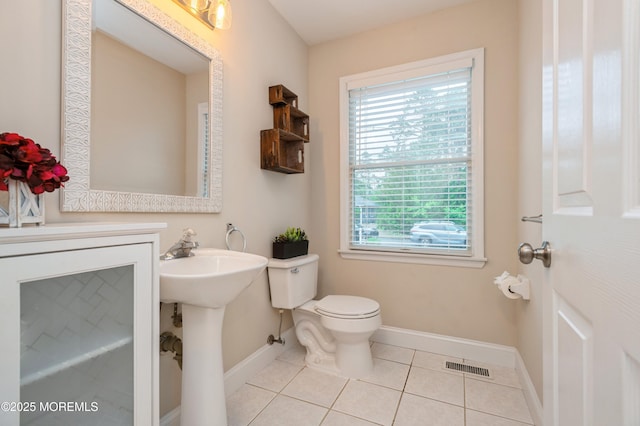476 Birch Bark Dr, Brick, NJ 08723 - bathroom with baseboards, tile patterned flooring, toilet, and a sink